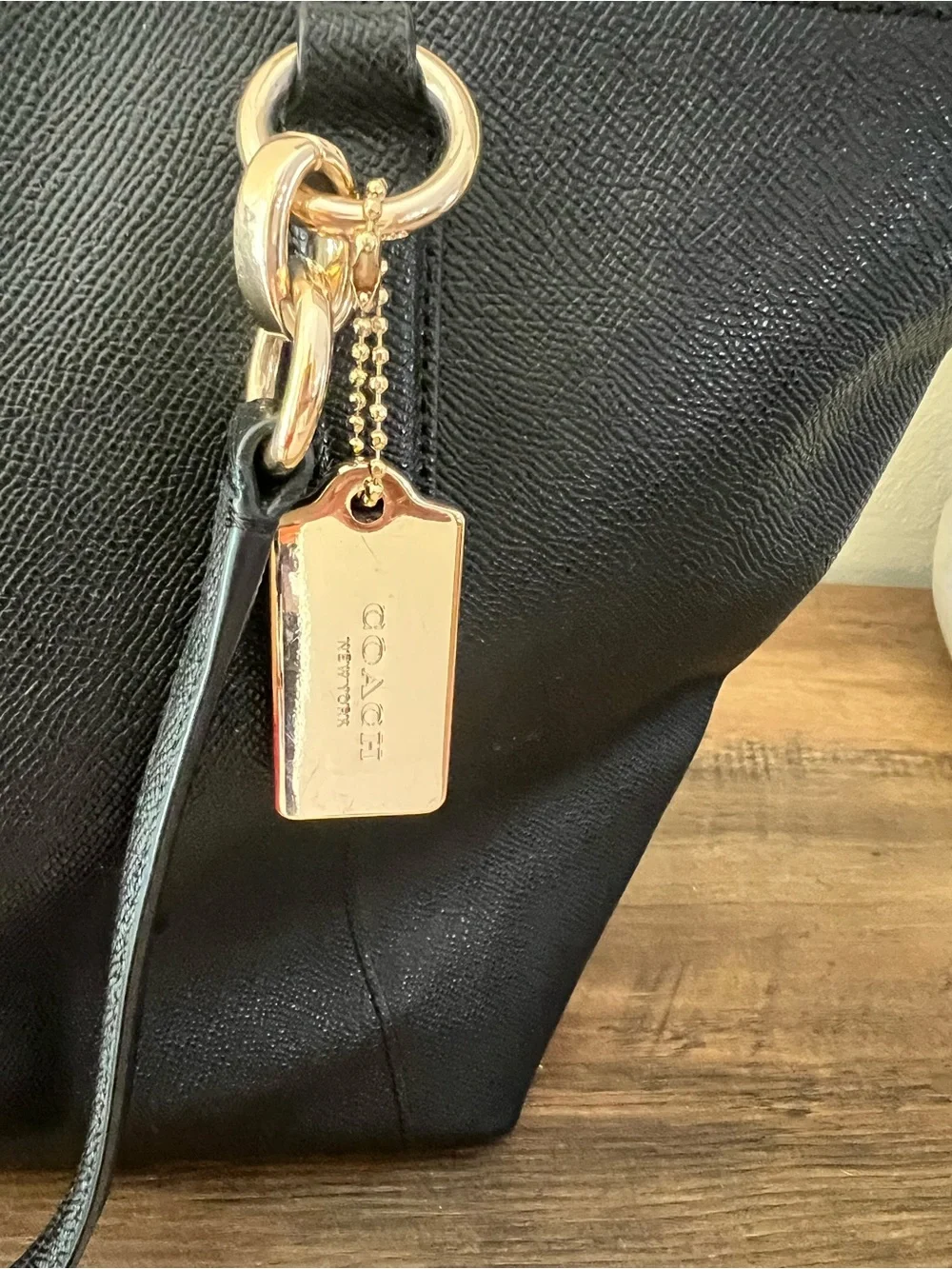 Coach sleek leather